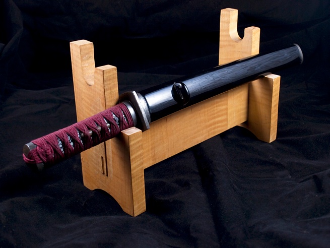 Tanto in full custom mount on a wooden display stand